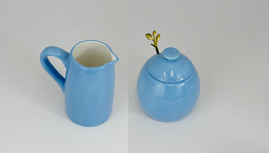 Vintage blue ceramic sugar selling and creamer set