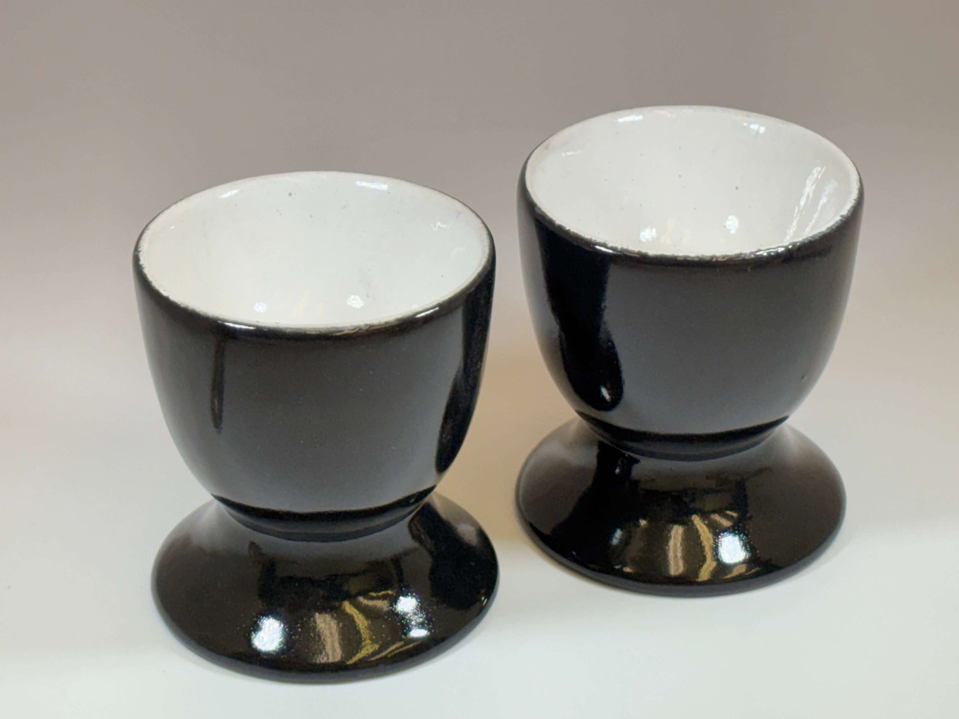 black ceramic egg cups