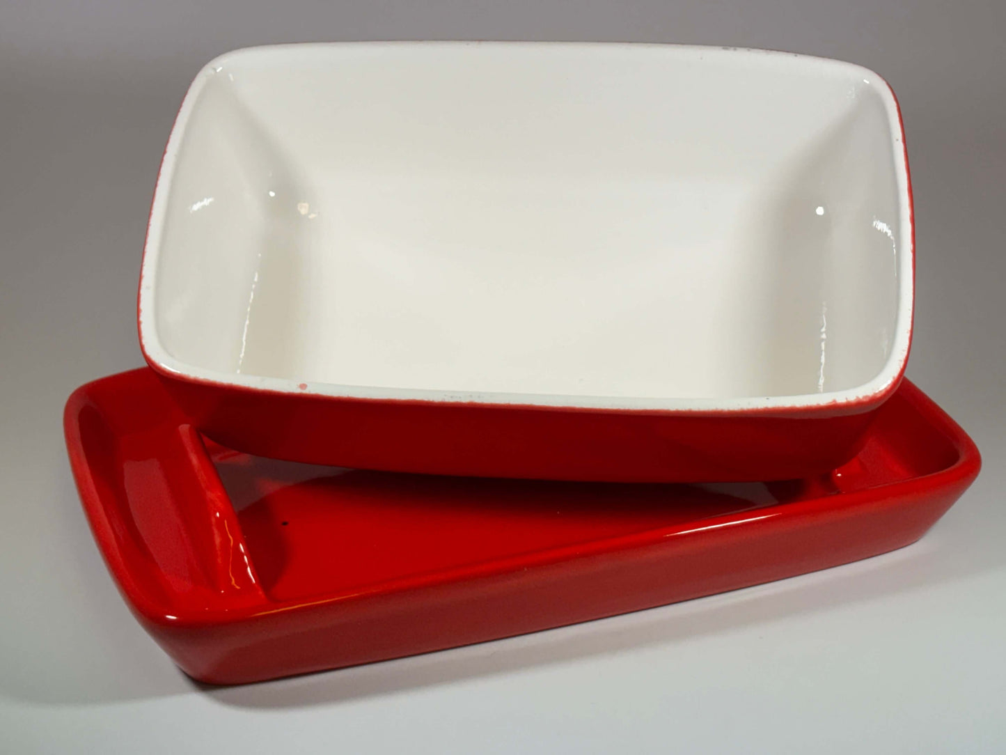 stoneware butter dish in red glaze