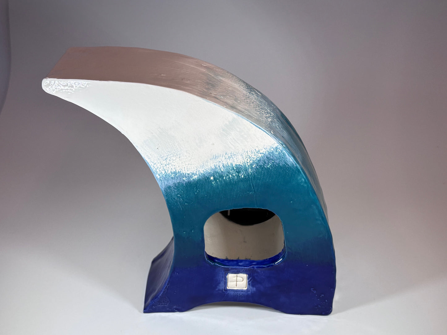 The Wave Ceramic Mantel Clock with Enclosed Face