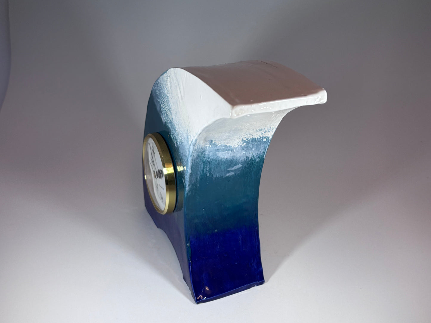 The Wave Ceramic Mantel Clock with Enclosed Face